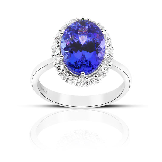 Oval Style Tanzanite halo Cocktail ring with Full cut Diamonds 14 Karat White Gold