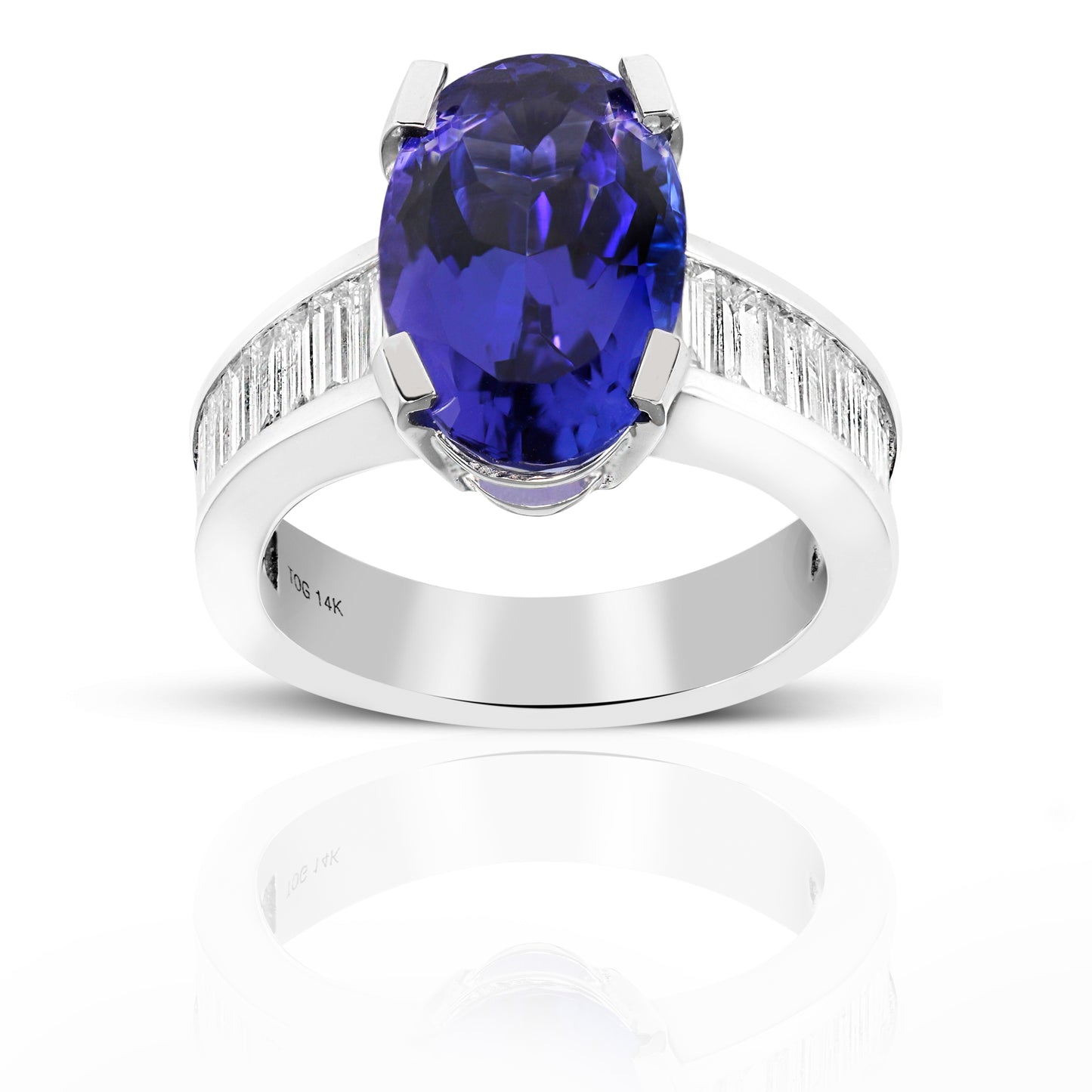 Oval Solitaire Tanzanite Cocktail ring with Baguette Diamond accents 14 Karat White Gold