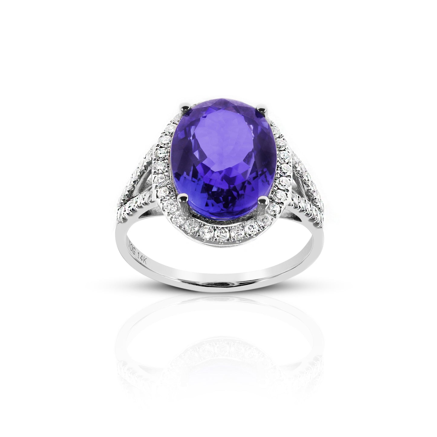 Cocktail style Oval Tanzanite halo ring with Pave' Diamond accents 14 Karat White Gold